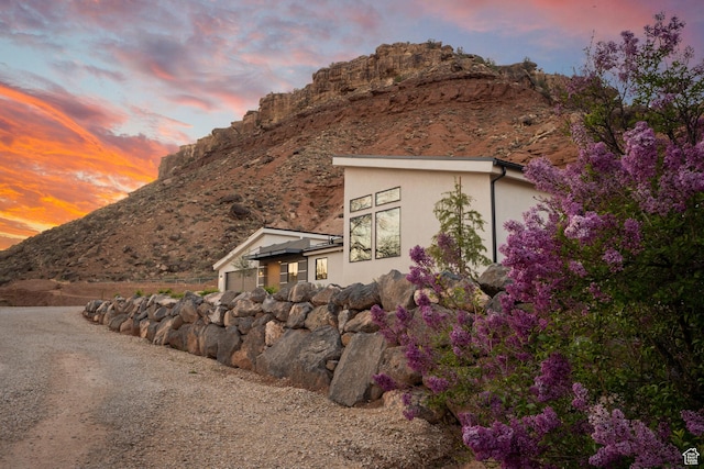 160 W Pebble, Rockville, UT 84763 - view of front of house with stucco siding and a mountain view