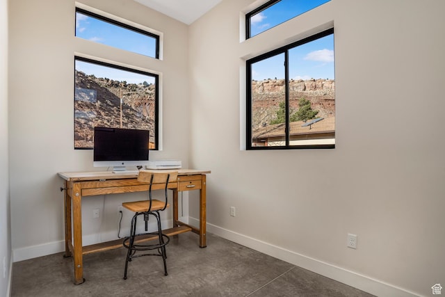 160 W Pebble, Rockville, UT 84763 - office area with baseboards and concrete flooring