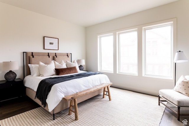 bedroom featuring baseboards