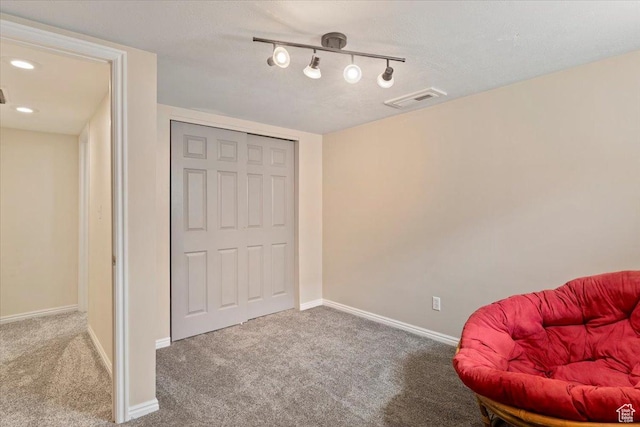 unfurnished room featuring recessed lighting, visible vents, baseboards, and carpet floors