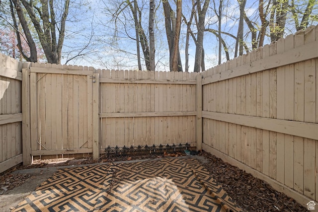 view of patio featuring fence