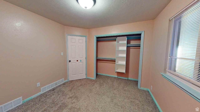 1653 N Cedar Blvd, Cedar City, UT 84721 - unfurnished bedroom featuring carpet flooring, visible vents, a closet, and baseboards
