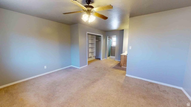 1653 N Cedar Blvd, Cedar City, UT 84721 - unfurnished bedroom featuring a closet, baseboards, light colored carpet, and ceiling fan