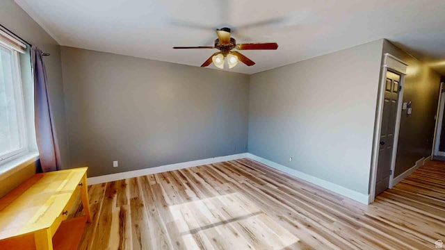1653 N Cedar Blvd, Cedar City, UT 84721 - empty room featuring light wood-style flooring, baseboards, and a ceiling fan