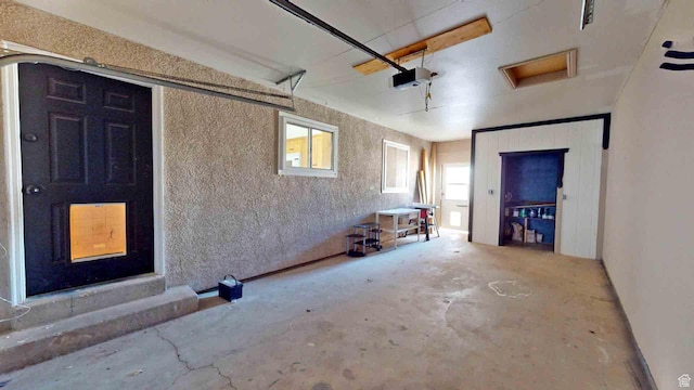 1653 N Cedar Blvd, Cedar City, UT 84721 - garage featuring a garage door opener
