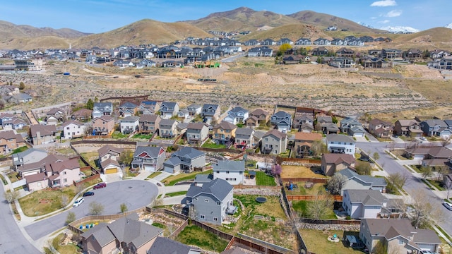 drone / aerial view with a mountain view and a residential view