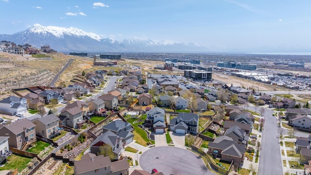 drone / aerial view with a mountain view and a residential view