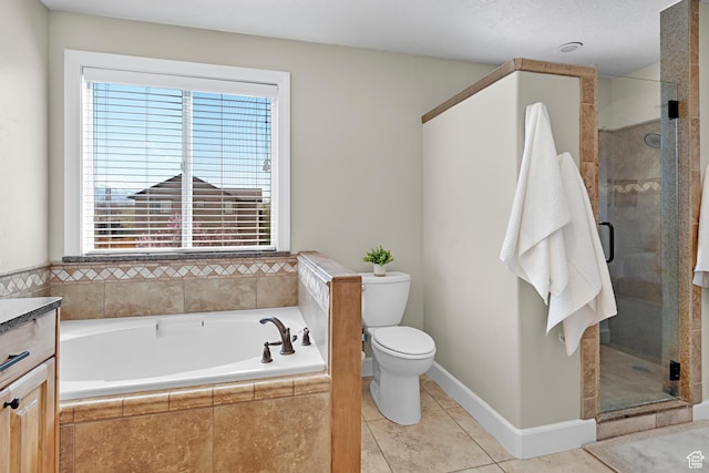 bathroom with tile patterned flooring, a bath, a stall shower, and toilet