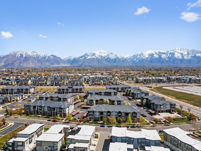 drone / aerial view featuring a mountain view and a residential view