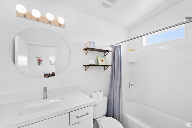 full bathroom featuring visible vents, toilet, shower / bathtub combination with curtain, vanity, and vaulted ceiling
