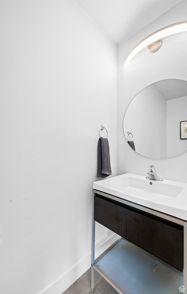 bathroom featuring vanity and tile patterned flooring