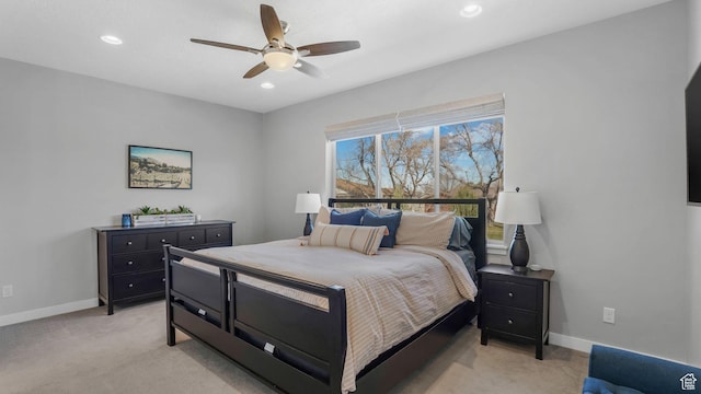 bedroom with baseboards, recessed lighting, ceiling fan, and light colored carpet