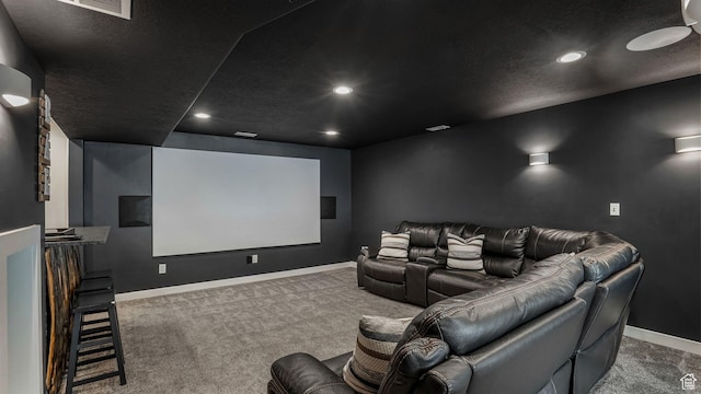 home theater room with recessed lighting, carpet, visible vents, and baseboards