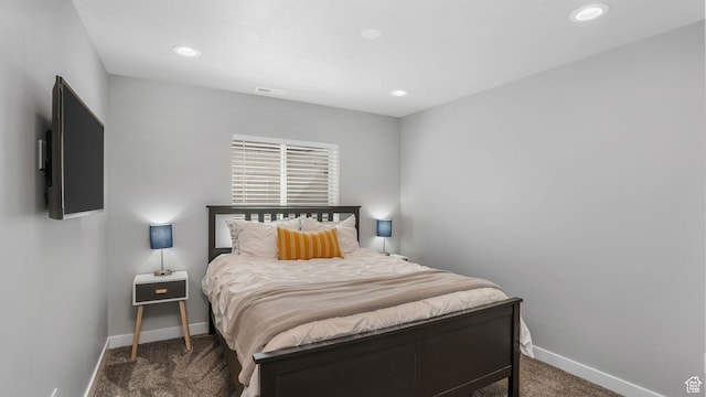 carpeted bedroom with baseboards, visible vents, and recessed lighting