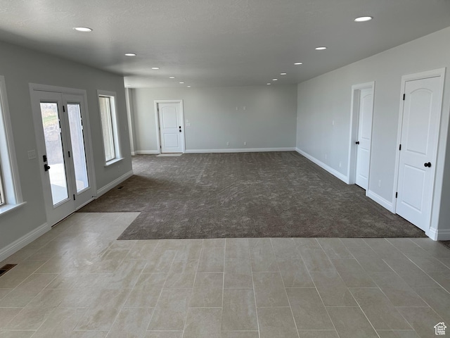 1234 S Parkway Blvd E Unit 725, Saratoga Springs, UT 84045 - unfurnished room featuring recessed lighting, visible vents, baseboards, and carpet floors