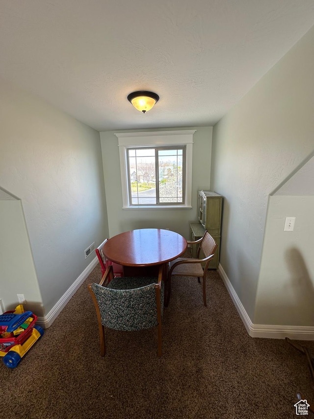 1234 S Parkway Blvd E Unit 725, Saratoga Springs, UT 84045 - dining room featuring visible vents, baseboards, and carpet