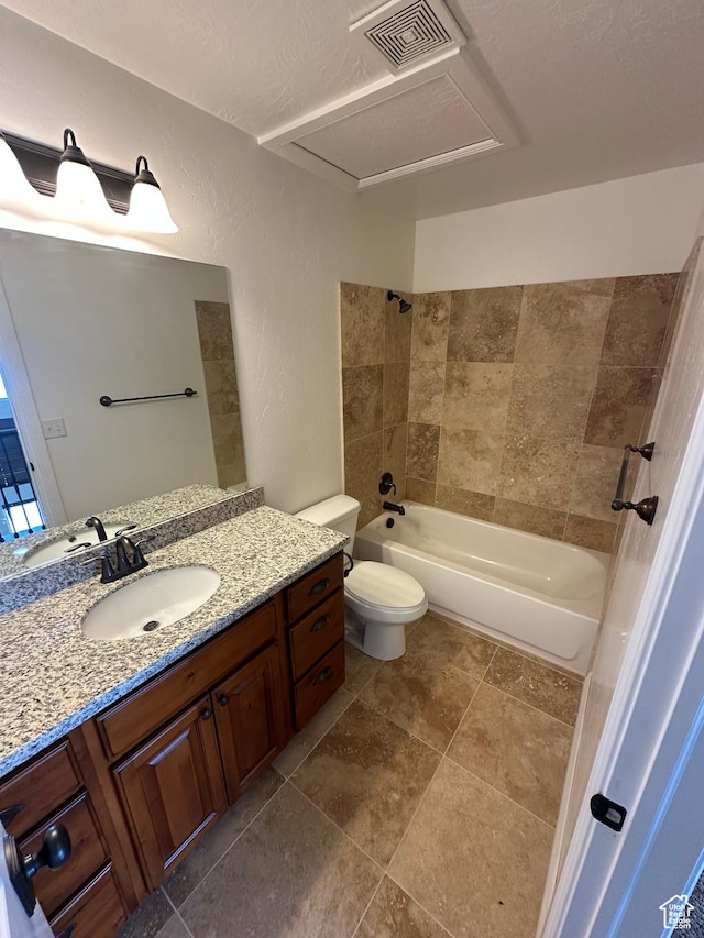 1234 S Parkway Blvd E Unit 725, Saratoga Springs, UT 84045 - full bath with vanity, visible vents, toilet, shower / bath combination, and a textured wall