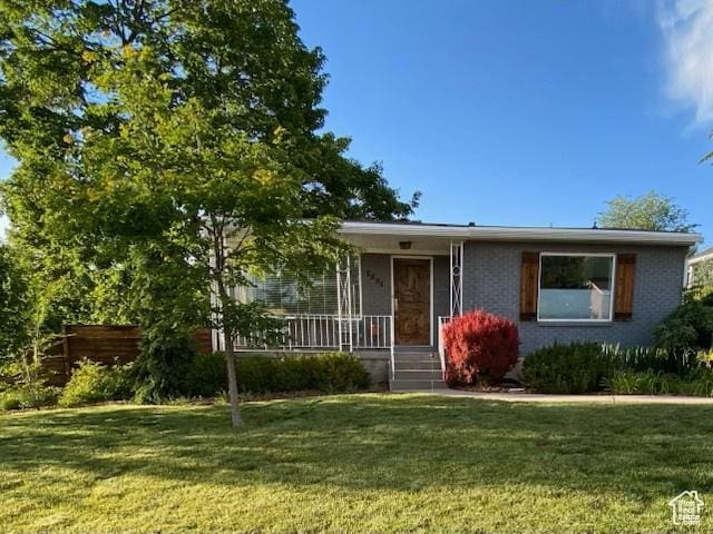 2895 E Wardway Dr S, Salt Lake City, UT 84124 - ranch-style home featuring covered porch and a front yard