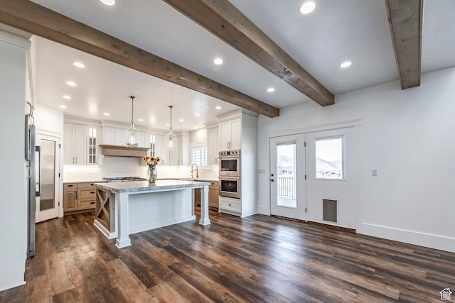 159 E 625 S, Mantua, UT 84324 - kitchen with stainless steel appliances, decorative backsplash, beamed ceiling, a center island, and dark wood-style flooring