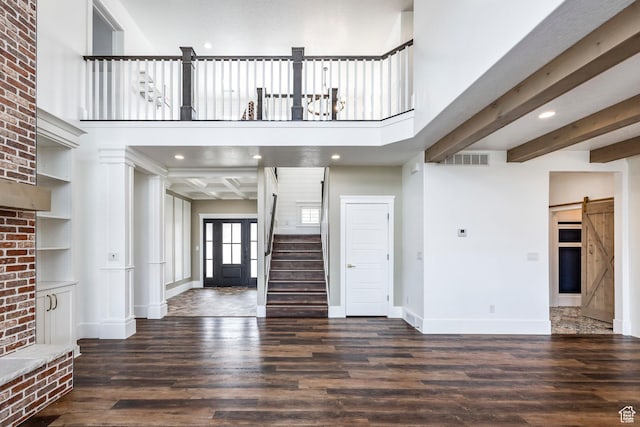 159 E 625 S, Mantua, UT 84324 - unfurnished living room featuring a barn door, wood finished floors, stairway, recessed lighting, and a high ceiling