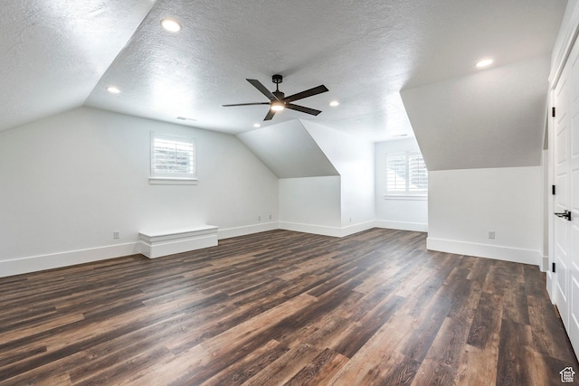 159 E 625 S, Mantua, UT 84324 - additional living space featuring vaulted ceiling, dark wood-type flooring, plenty of natural light, baseboards, and ceiling fan