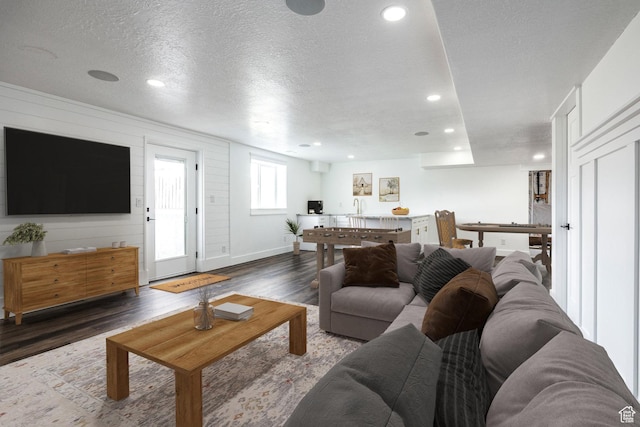 159 E 625 S, Mantua, UT 84324 - living room with wood finished floors, baseboards, recessed lighting, and a textured ceiling