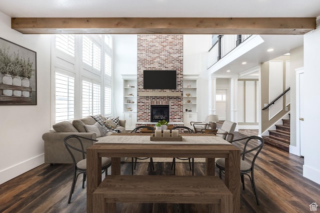 159 E 625 S, Mantua, UT 84324 - dining space with baseboards, healthy amount of natural light, a brick fireplace, dark wood-style flooring, and recessed lighting