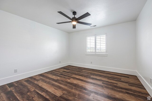 159 E 625 S, Mantua, UT 84324 - unfurnished room with dark wood-type flooring, a ceiling fan, and baseboards
