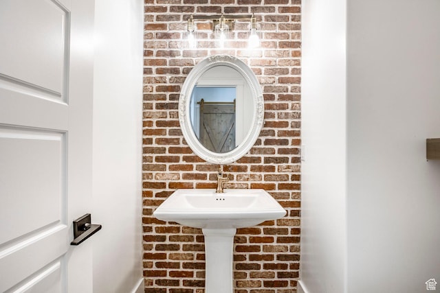 159 E 625 S, Mantua, UT 84324 - bathroom with brick wall and a sink