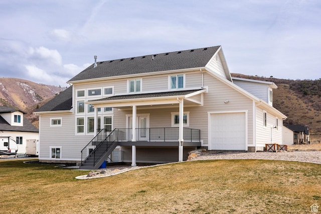 159 E 625 S, Mantua, UT 84324 - back of house with a mountain view, stairway, a lawn, and a garage