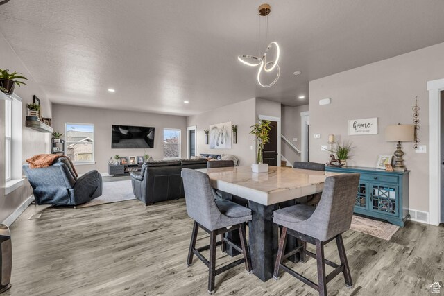 1962 Bluff Crest Rd Unit 4, Francis, UT 84036 - dining room featuring baseboards, recessed lighting, stairway, light wood-style flooring, and visible vents