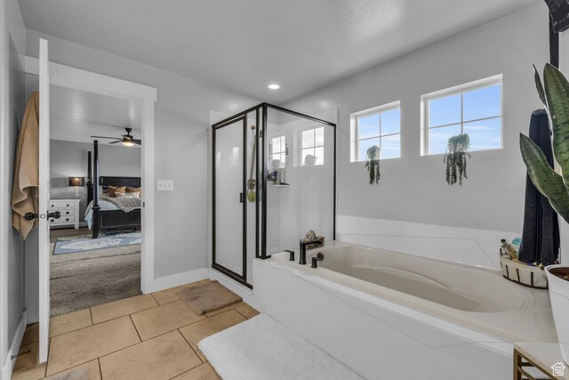1962 Bluff Crest Rd Unit 4, Francis, UT 84036 - ensuite bathroom featuring a garden tub, ensuite bath, a ceiling fan, a stall shower, and tile patterned floors