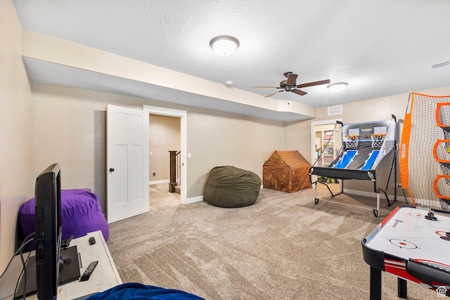 1125 S 400 E, Salem, UT 84653 - playroom with carpet flooring, visible vents, a textured ceiling, and a ceiling fan