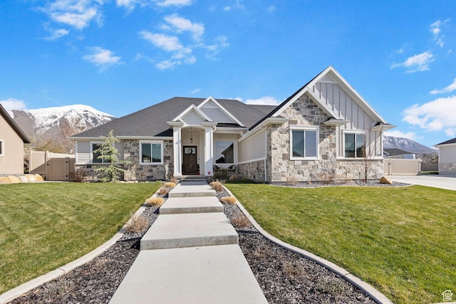 1125 S 400 E, Salem, UT 84653 - craftsman-style home with a mountain view, stone siding, board and batten siding, fence, and a gate