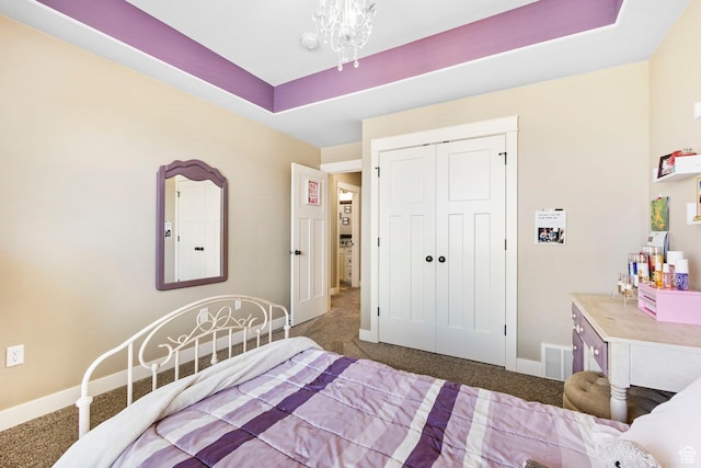 1125 S 400 E, Salem, UT 84653 - carpeted bedroom with visible vents, baseboards, a tray ceiling, and a closet