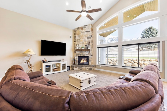 1125 S 400 E, Salem, UT 84653 - living area featuring a stone fireplace, baseboards, carpet flooring, ceiling fan, and high vaulted ceiling