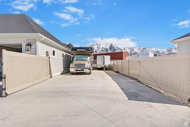 1125 S 400 E, Salem, UT 84653 - view of patio with a mountain view, driveway, fence, and a gate