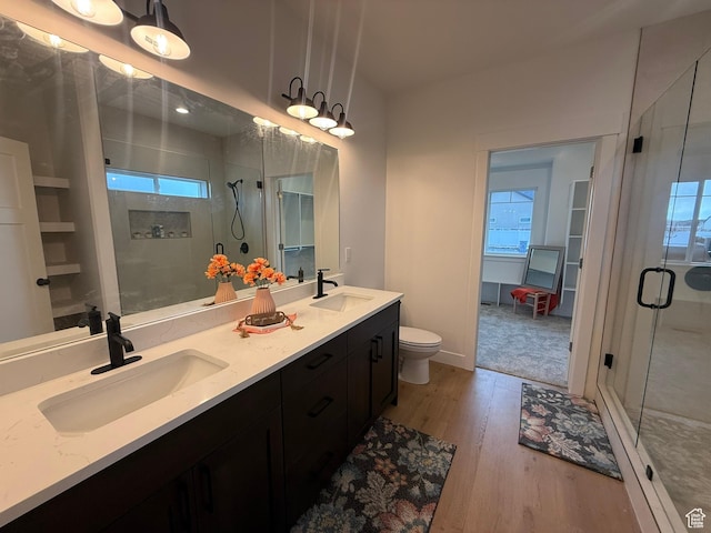 3758 W Alder Ct, Taylor, UT 84401 - full bath with a sink, a stall shower, and wood finished floors