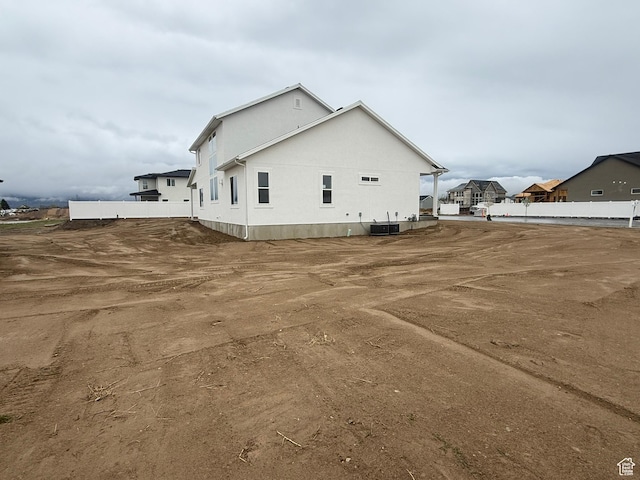3758 W Alder Ct, Taylor, UT 84401 - view of side of property featuring central AC and fence