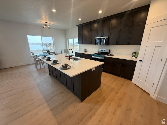 3758 W Alder Ct, Taylor, UT 84401 - kitchen featuring a sink, recessed lighting, appliances with stainless steel finishes, and light wood-style floors