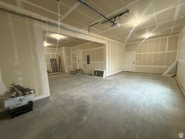 3758 W Alder Ct, Taylor, UT 84401 - garage featuring a garage door opener