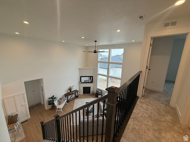 3758 W Alder Ct, Taylor, UT 84401 - stairs with a fireplace, visible vents, and recessed lighting