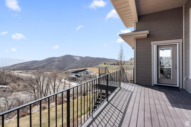 balcony featuring a mountain view