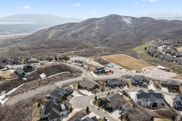 drone / aerial view with a residential view and a mountain view
