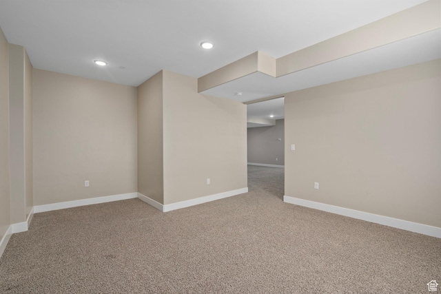 finished below grade area featuring recessed lighting, baseboards, and carpet floors