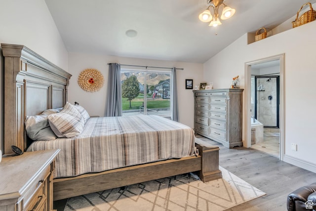 4071 S Sandpiper Ln, Saratoga Springs, UT 84045 - bedroom featuring baseboards, light wood-style floors, connected bathroom, and vaulted ceiling