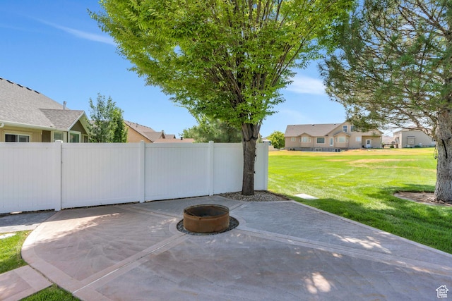 4071 S Sandpiper Ln, Saratoga Springs, UT 84045 - view of patio / terrace with a residential view, a fire pit, and fence