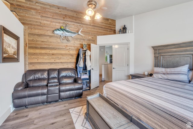 4071 S Sandpiper Ln, Saratoga Springs, UT 84045 - bedroom with wood finished floors and wooden walls