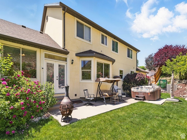 1411 S Slate Canyon Dr, Provo, UT 84606 - rear view of property with a hot tub, stucco siding, a patio, and a yard