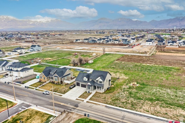 drone / aerial view with a mountain view and a residential view